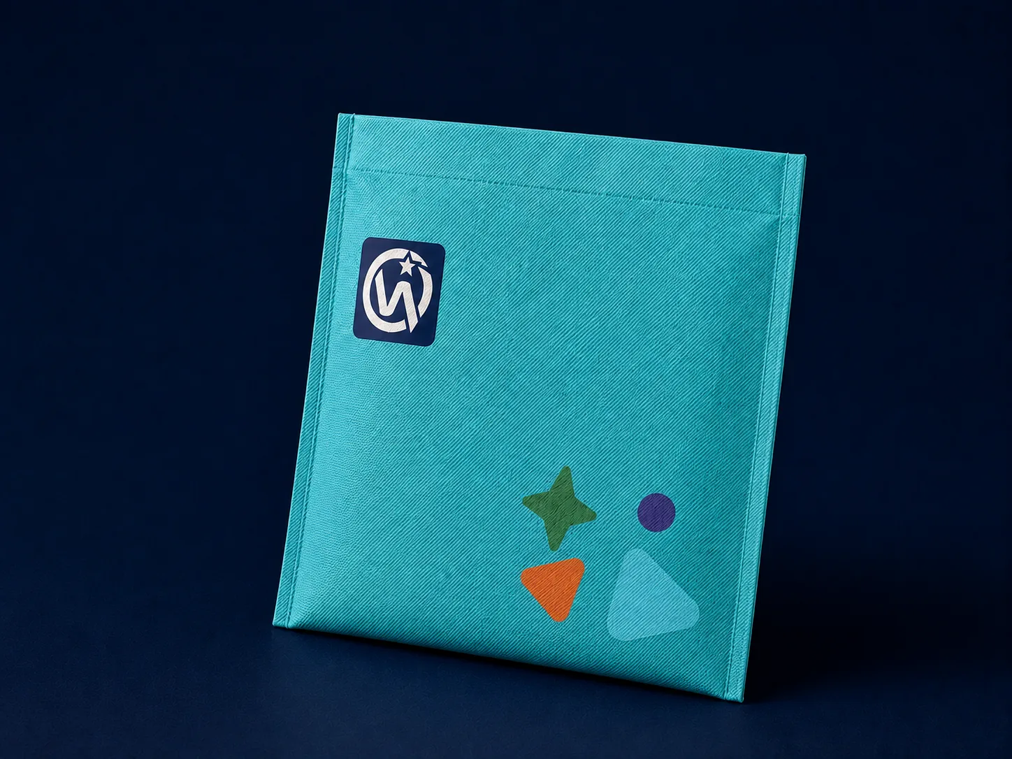 Coloured Non-Woven Film — Solid-colour spunbond PP base with overprinted brand graphics